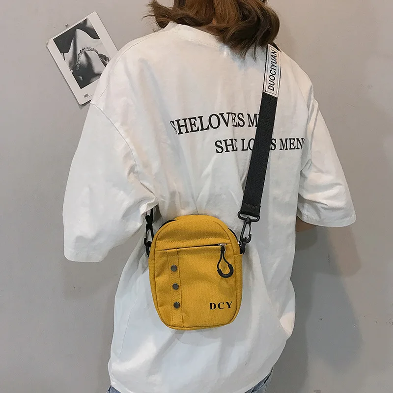 

Korean fashion canvas small bag personality girl student rivet small bag Women mobile phone bag