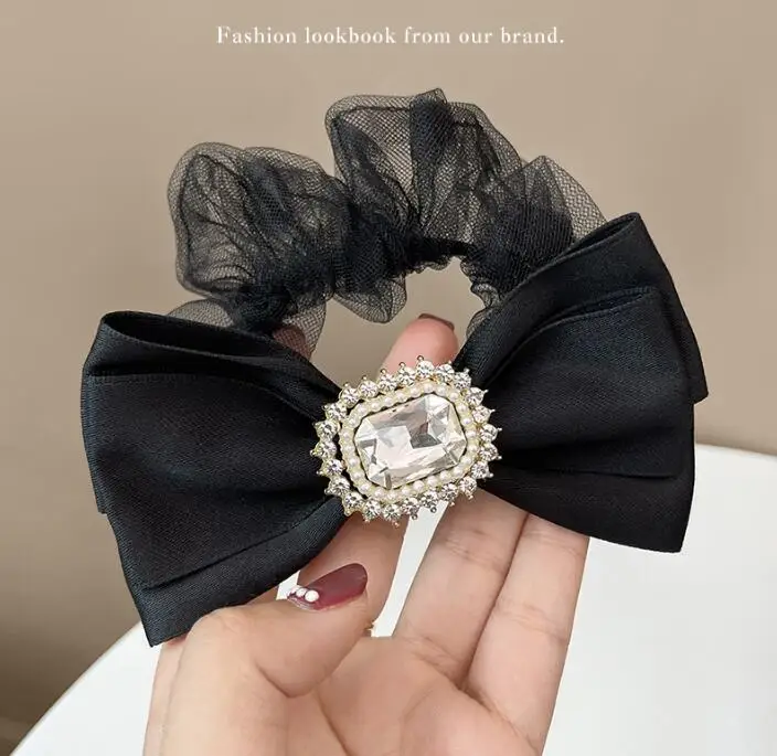 

Korea's new pearl bowknot pig hair ring rubber band ins black Korean version black mesh hair rope