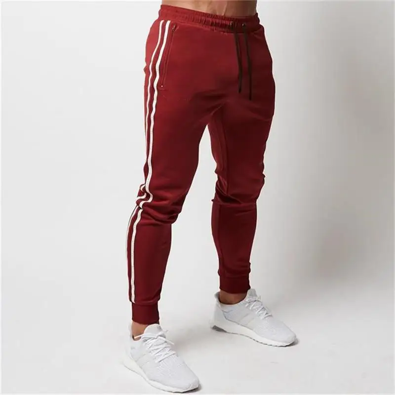 

2020 Sports Men Gyms Pants Joggers Fitness pure color Long Pants Men Workout Skinny Sweatpants Jogger Running men Trousers 3XL