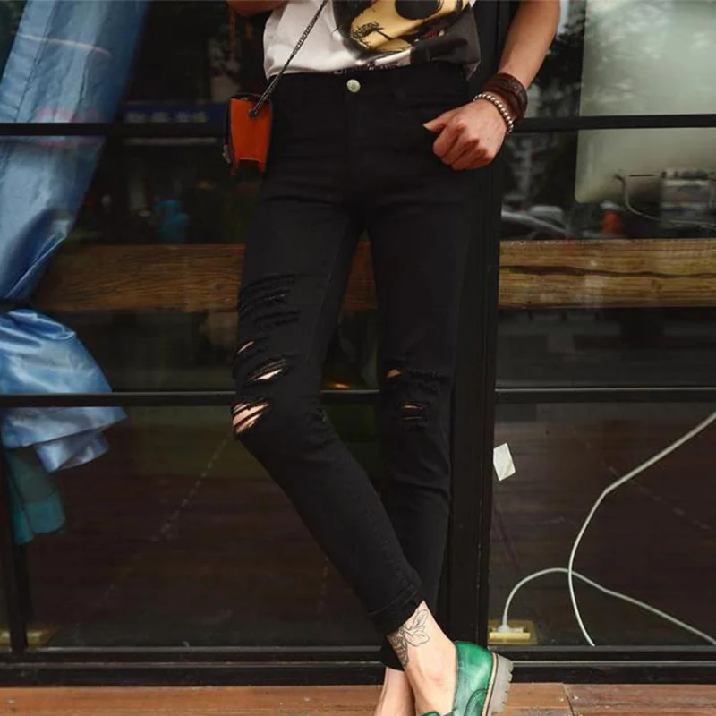 Мужские джинсы с вырезами на коленях черные в европейском и американском стиле