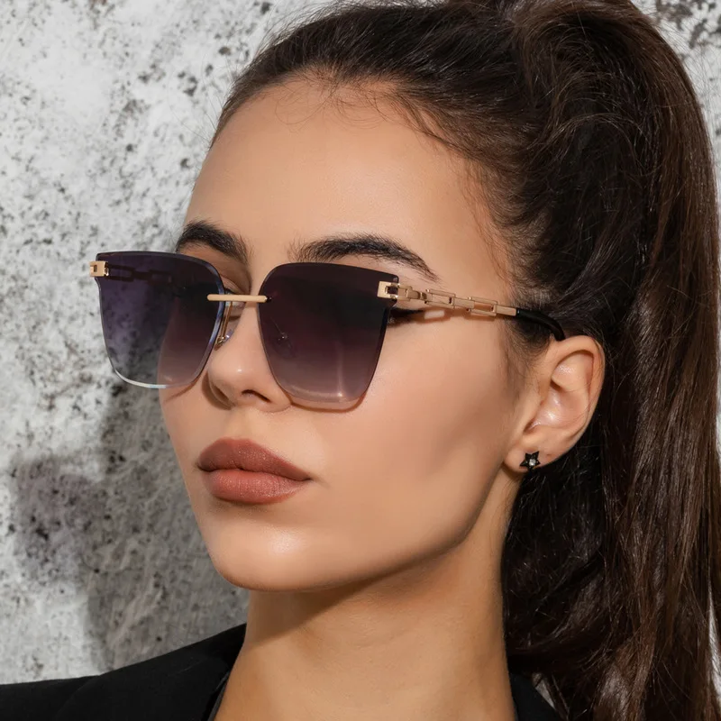 

Trending Frameless Trimming Women's Sunglasses Vintage Metal Hollow Out Chain Glasses Legs Gradient Lenses Luxury Brand Eyewear