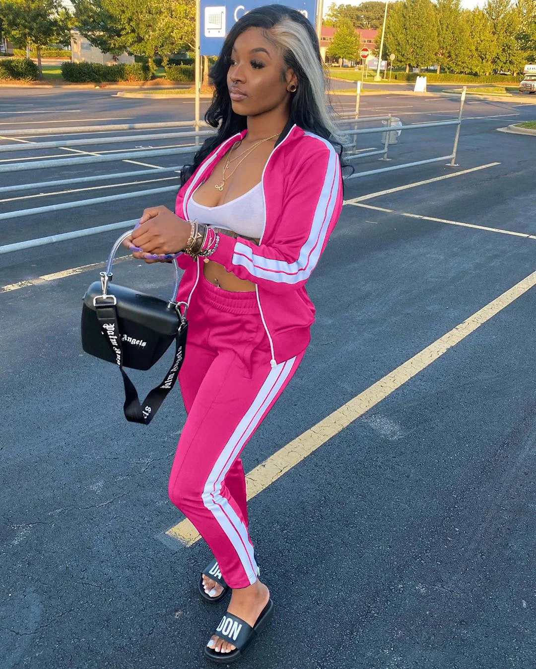 

Autumn European And American Ladies Fashion Casual Home Outdoor Commuting Temperament Pure Color Zipper Sports Two-Piece Suit