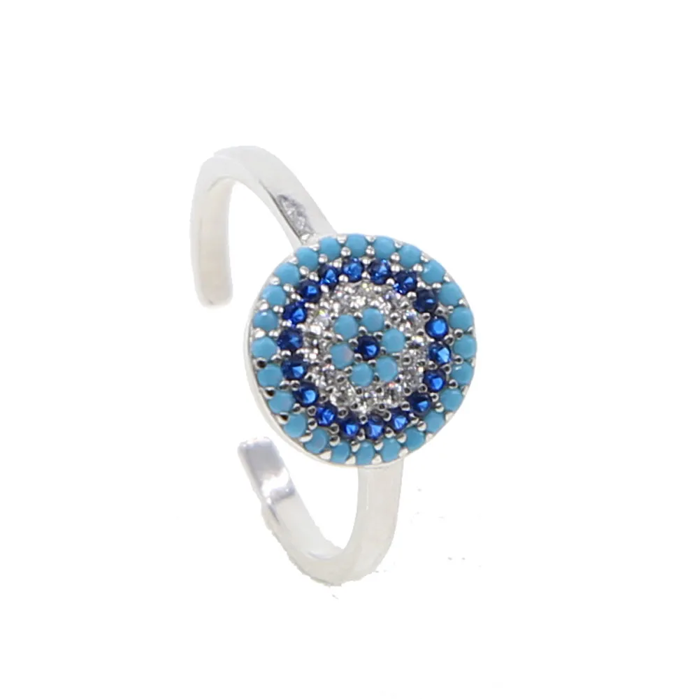 Женское кольцо средней длины с фианитом регулируемое из серебра 925 пробы голубым