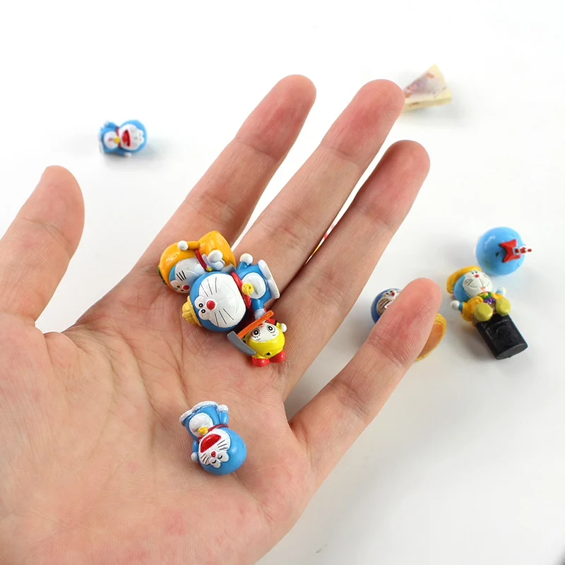 

10pcs/lot Anime Doraemon Figure Toy Cute Doraemon Lantern Skating Table Tennis Mini Model Doll for Children