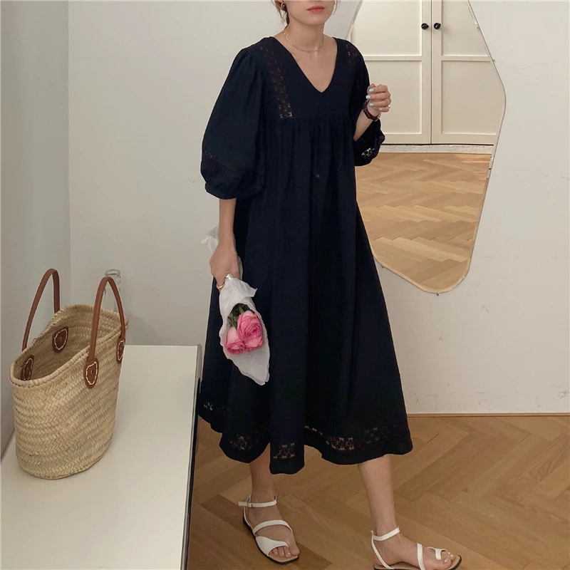 

Casual women's dress spring and summer design sense loose short-sleeved V-neck doll skirt hollow lace stitching dress