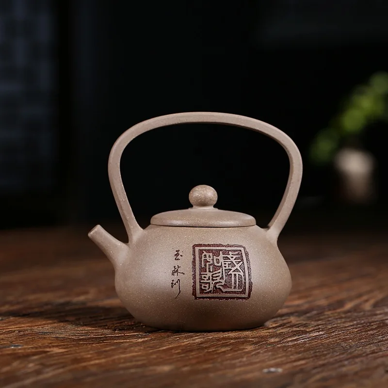 

Yixing Famous Manual Dark-red Enameled Pottery Teapot Raw Ore Grey Lime Section Clay Pottery Garden Handle Teapot Online Store