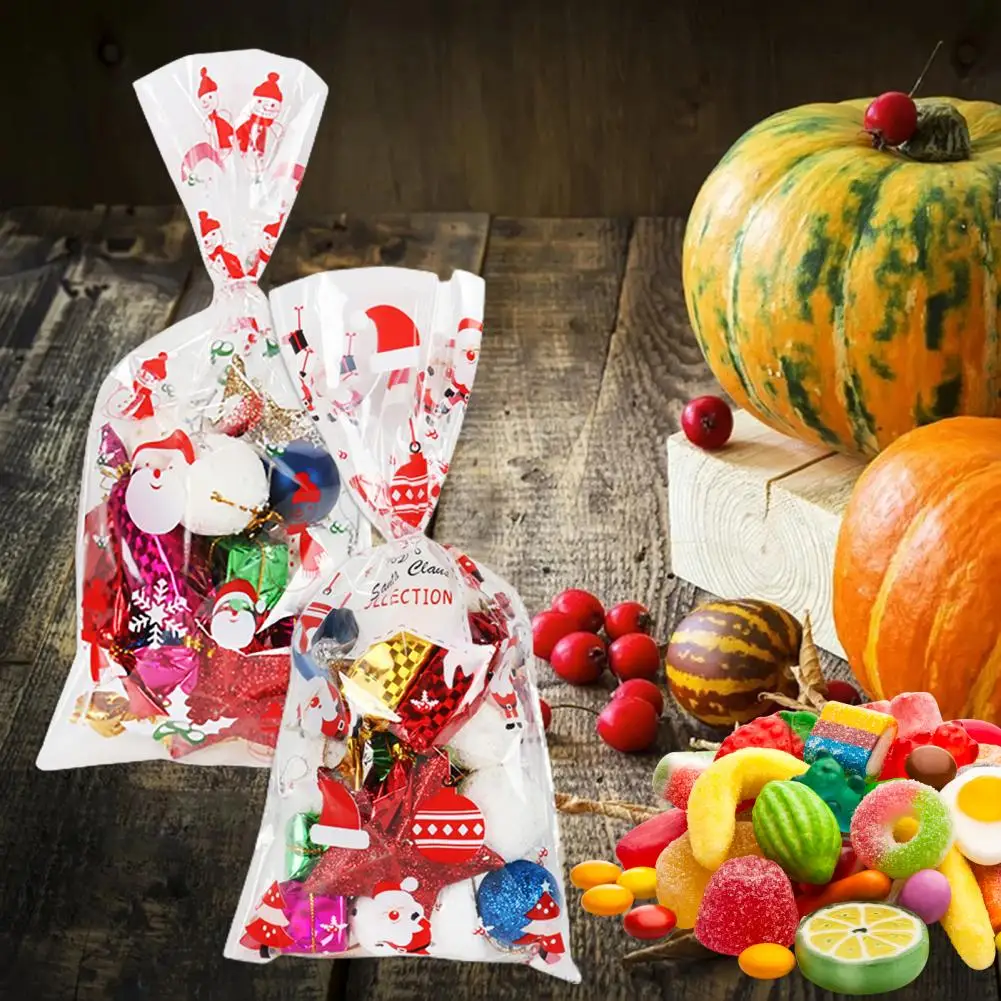 

Attractive Lovely Xmas Pattern Party Favor Bags 50Pcs Eco-friendly Gift Bag Cartoon Pattern Plastic Santa Claus Print Candy Bags
