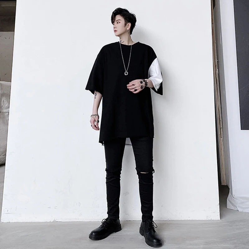 

2020 summer Hong Kong style student black and white irregular splicing top round neck loose casual men's net red short sleeve T-