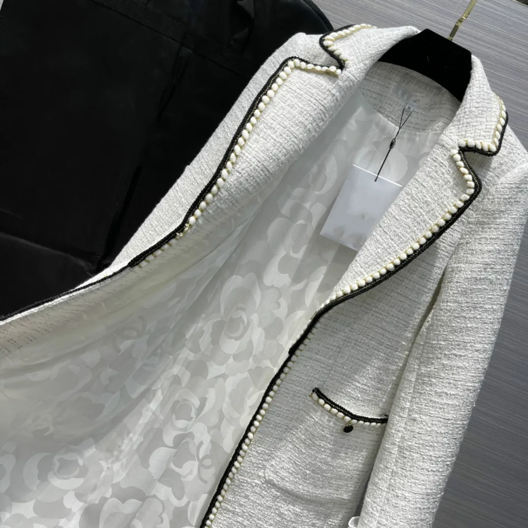 

2021 New White Jackets Women High-end Brand Lace Petal Sleeve Splicing Knitting Jackets Spring Office Lady Big Pocket Long Coat