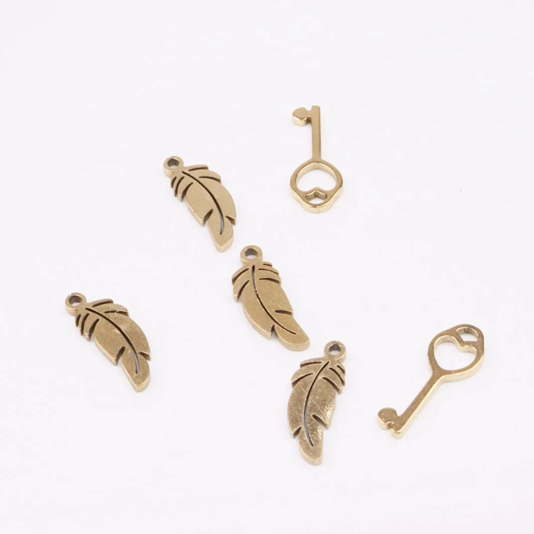 10 шт. оптовая продажа Нержавеющая сталь Mimi ключ амулеты перья кулон &quotсделай