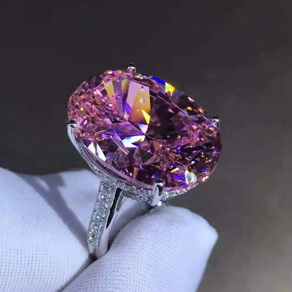 

Wong Rain 925 Sterling Silver 15 CT Oval Cut Hyperbole Luxury Pink Created Moissanite Cocktail Ring Customized Ring Fine Jewelry