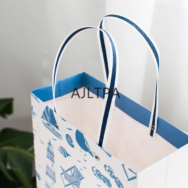 

100pcs/lot Creative Paper Gifts Bag Portable Paper Bags Retro Paper Clothing Rivets Christmas Decoration Home Gift Bags CT0301