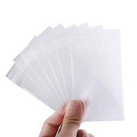100pcslot transparent card protector for board games gathering sleeves