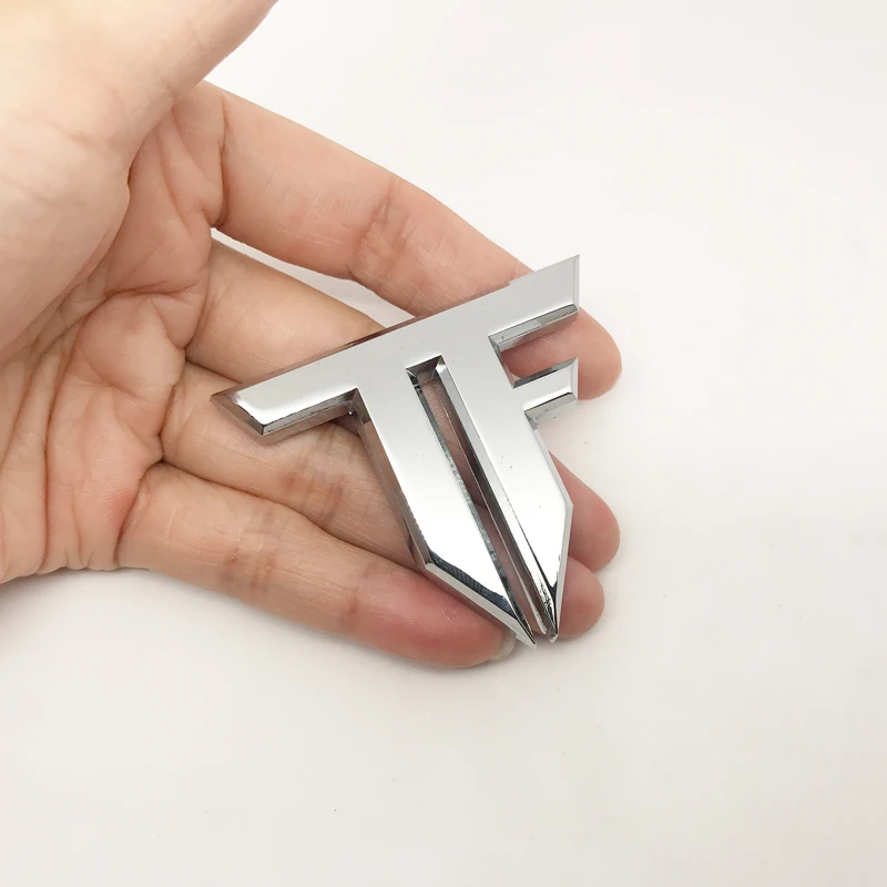 

Автомобильный Стайлинг 3D металлическая эмблема TF значок-трансформер наклейка для Hyundai Toyota Nissan Audi Skoda Renault Opel Лада Chevrolet