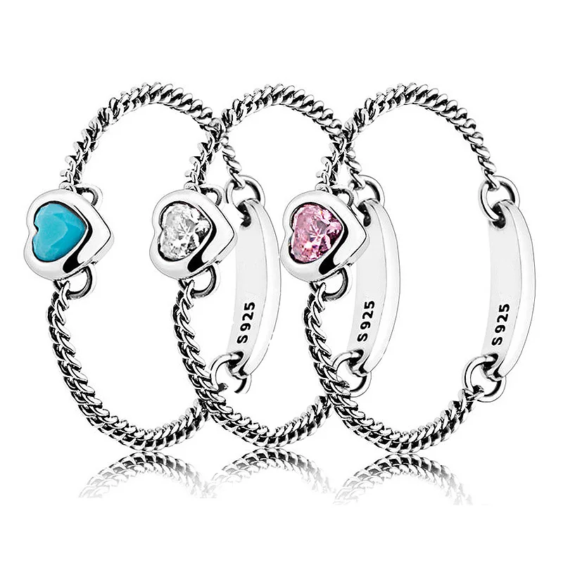 

Женское кольцо из серебра 925 пробы, с розовым, голубым и прозрачным кристаллом