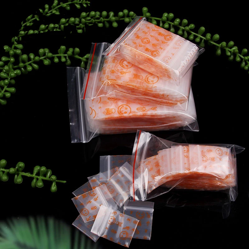 Симпатичные пластиковые пакеты на молнии с оранжевыми смайликами 100 шт.