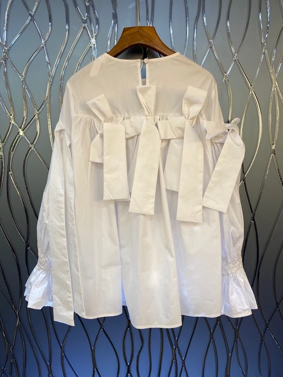 

2021 spring new women's fashion round neck irregular decoration sleeve tie bow solid color top 303