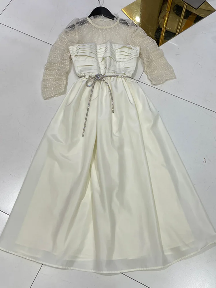 

Retro stitching, hollow, mesh, draped waist, tie bow, loose and big hem, retro dress, ladies spring 2021 new fashion