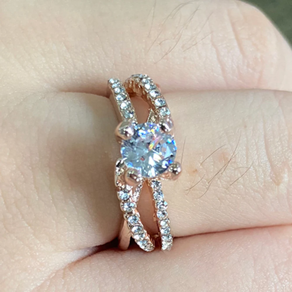 Кольцо женское перекрещивающееся под розовое золото с цирконом | Украшения и