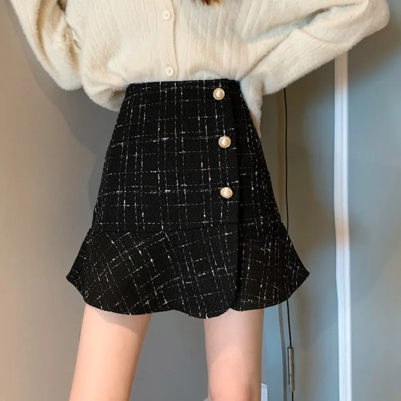 

bust of 2021 new design feeling small a word skirt girl tall waist grid bag hip fishtail skirt in the spring and autumn