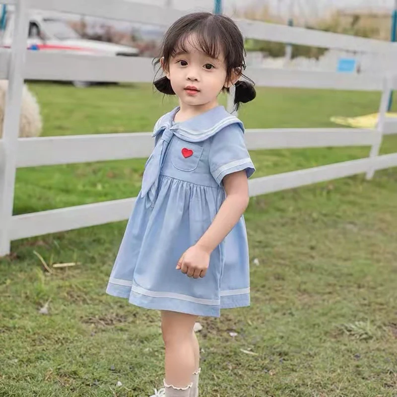 

Платье в стиле преппи для девочек, летнее модное платье с коротким рукавом, на пуговицах, с матросским воротником, милая детская одежда прин...