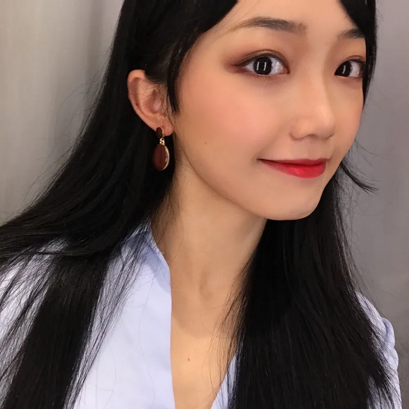 

Wind restoring ancient ways morandi personality advanced sense of elliptic drop glaze color geometry earring earrings