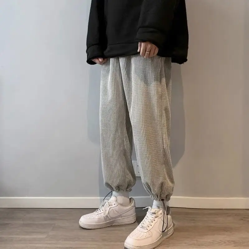 

Брюки мужские вельветовые повседневные, спортивные штаны с вафельным принтом, универсальные свободные шаровары до щиколотки с широкими шт...