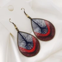 retro ethnic wind advanced sense of hand woven thread hollow earrings