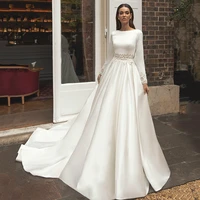 2020 bohemian bride dresses bateau neck applied pearls white satin wedding dress with long sleeves backless robe de mariee