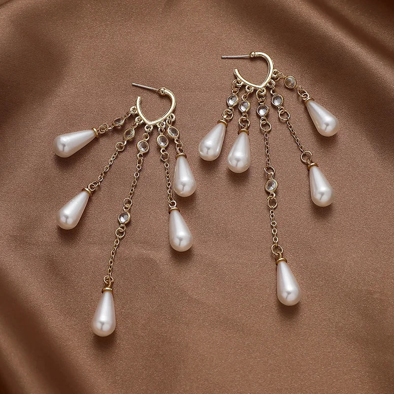 

Pearl heart tassel earrings With diamond shining brightly Delicate gentle Temperament sweet girl fashion Korea ins wholesale