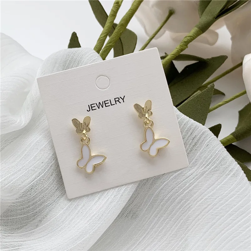 Женские винтажные серьги гвоздики с бабочкой корейский серебряный цвет белый