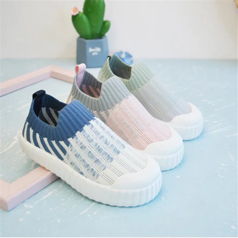 

Spring 2021 children's shoes fashion stripe boys' and girls' soft soled non slip slip slip on shoes flying woven casual shoes