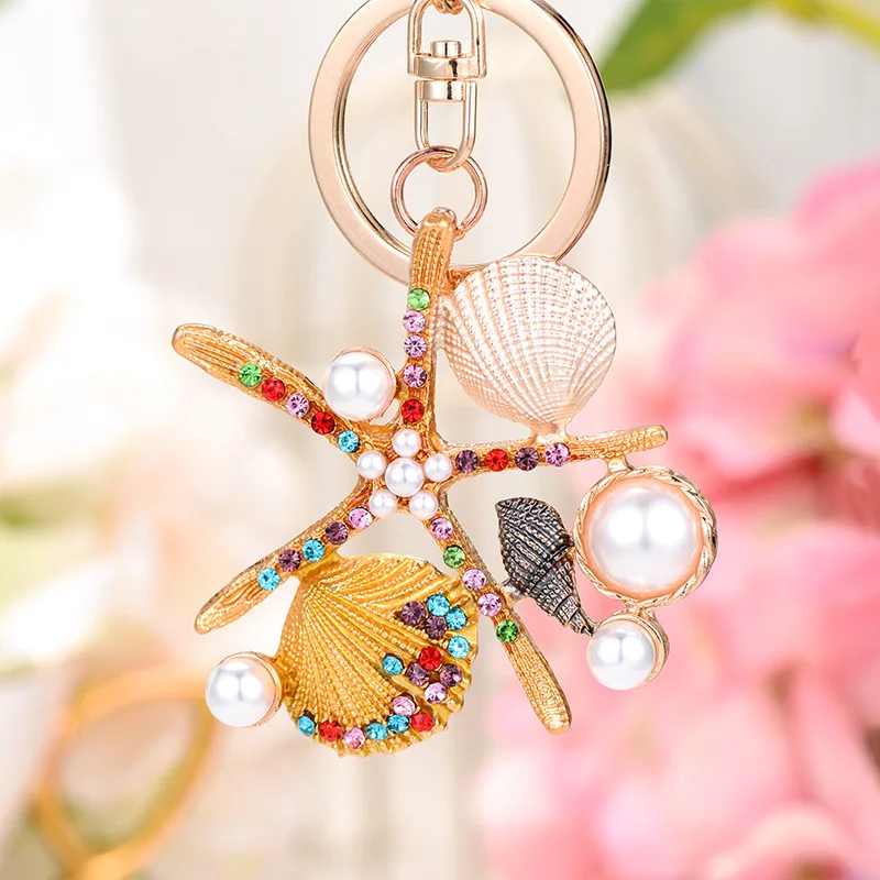 

Ocean Series Creative Keychain Gifts Starfish Shell Keyring Scallop Imitation Pearls Ornaments Car Bag Charm Jewelry Key Pendant