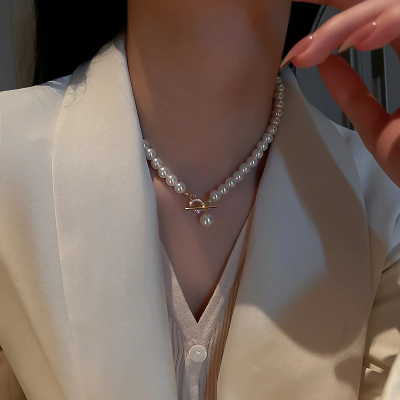 

South Korea fashion simple choker new micro - zircon pearl T - shaped necklace web celebrity temperament design sense of necklac