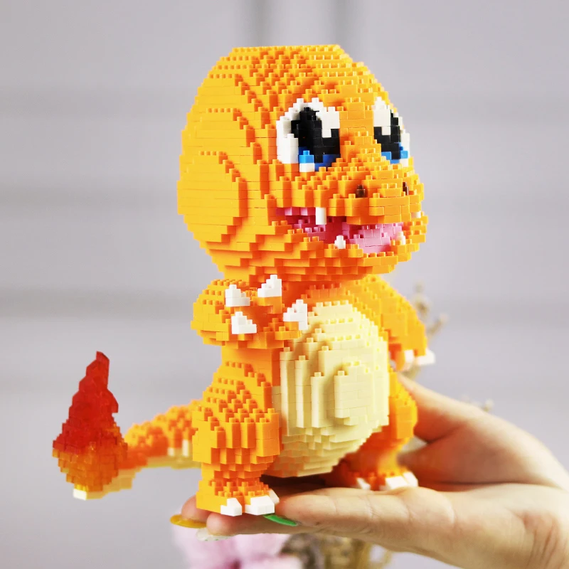 

1778pcs 9021 Anime Charmander Pocket Monster Dragon Animal 3D Model DIY Mini Diamond Building Blocks Bricks Assembly Toy No Box