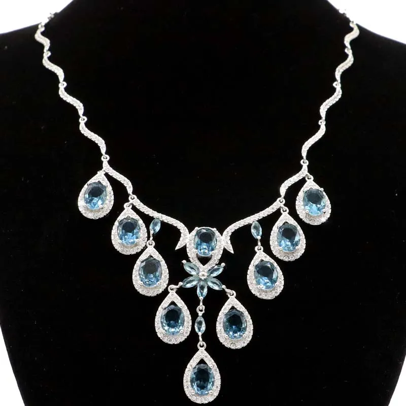 

Роскошное женское серебряное ожерелье 80x54 мм 30,7 г с лондонским голубым топазом и белым кубическим цирконием 17-18 дюймов