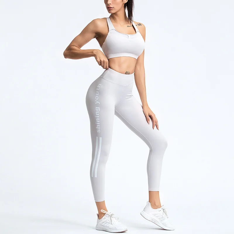 

Hot Selling High Quality Quick Drying Women's Yoga Suit Solid Color Sleeveless Bra Vest High Waist Tights Fitness Two Piece Set