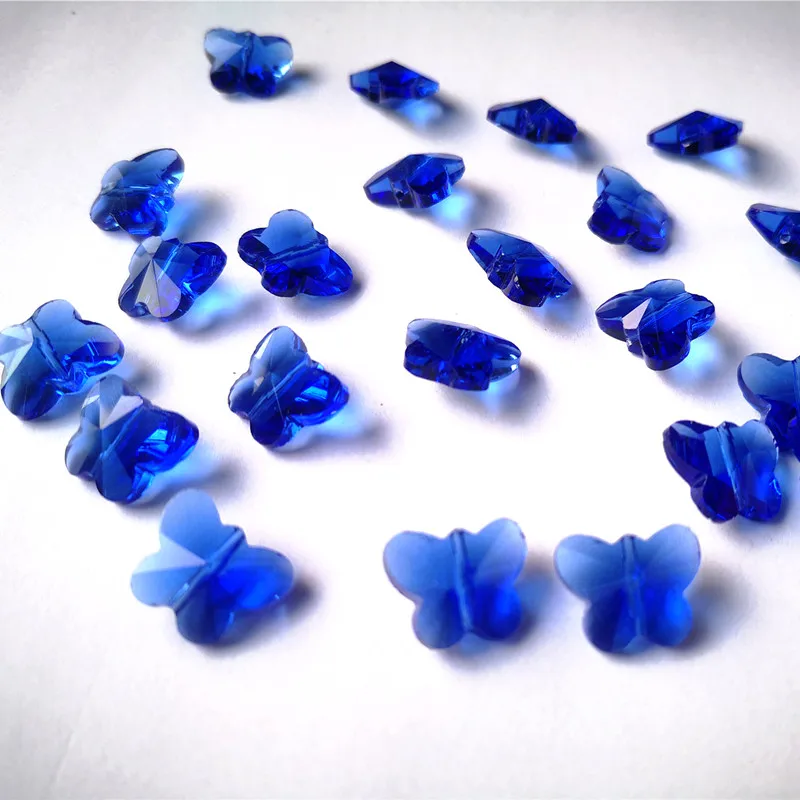 

Top Quality 100pcs/lot 14mm Bue Crystal Glass Butterfly Beads 1 Hole For Chandelier Parts Diy Curtain Accessories Decoration