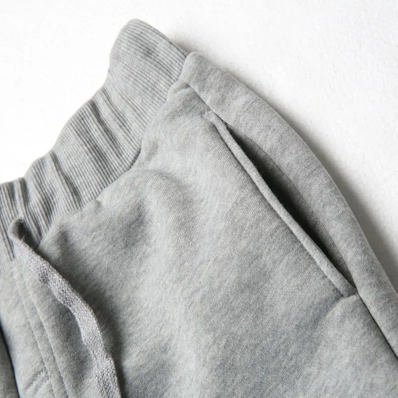 

Men's fitness sports pants jogging fitness trousers soft elastic running pants gym men's solid color football sports trousers