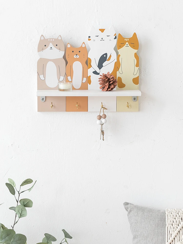 

The shelf is decorated on the wall with A-shaped partition, and the key at the entrance of the entrance is hung on the wall