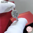 Geoki 925 пробы серебро прошел алмаз Тесты 1 Ct идеальный крой D Цвет VVS1 Муассанит 4 зубчатое кольцо с камнем Роскошные ювелирные изделия