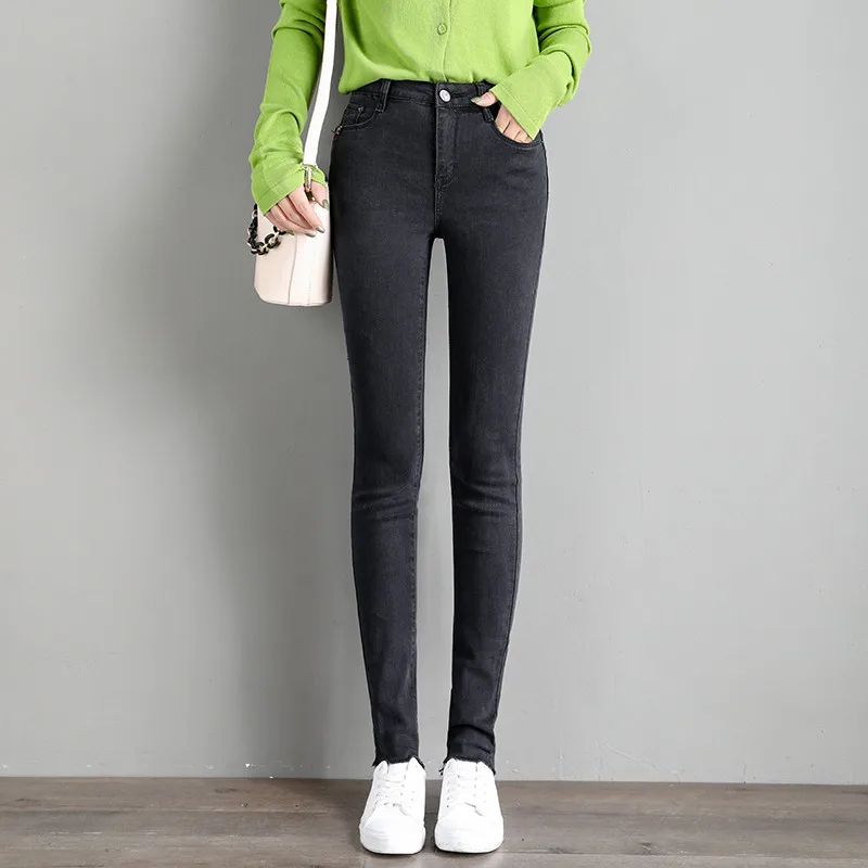Женские джинсы на весну и осень облегающие со средней посадкой Эластичные