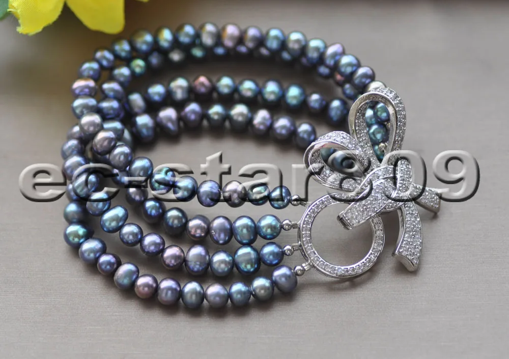 

Z10139 4Row 8" 7mm Peacock-Black Round Freshwater Pearl Bracelet CZ