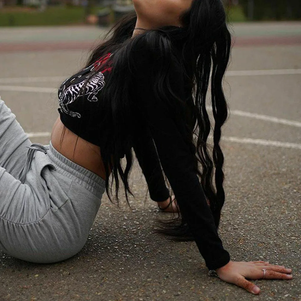 

Western Style Fashion Temperament Printing Hollow Out T-Shirt Navel Solid Color Hipster Round Neck Long Sleeve Casual