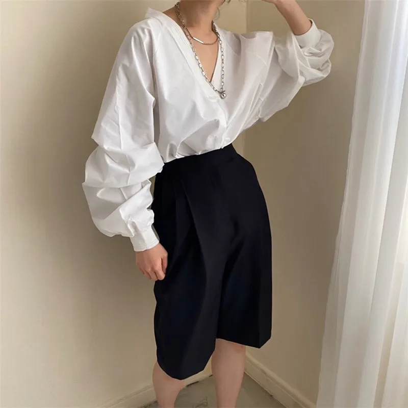 

RUGOD 2021 all-match v-neck loose clavicle shirt women