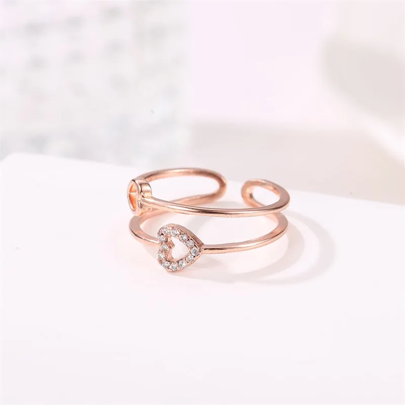 

QW European and American new hand ornaments fashion love zircon female ring simple hollowed-out ring cross-border accessories