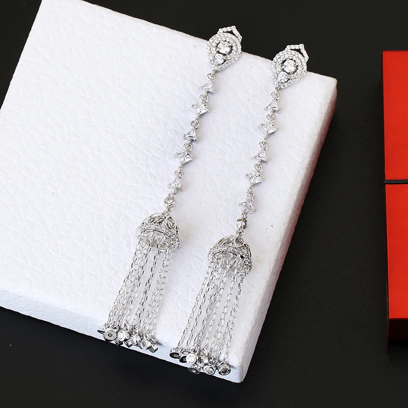 Женские серьги с длинной цепочкой и кисточкой прозрачным кубическим цирконием 100