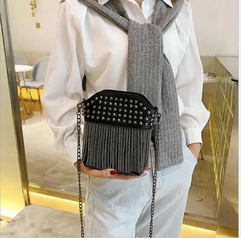 

2021 New Rivet Women's Bag Chain Tassel Bag Pu Leather One Shoulder Bag Messenger Bag Leisure bag.