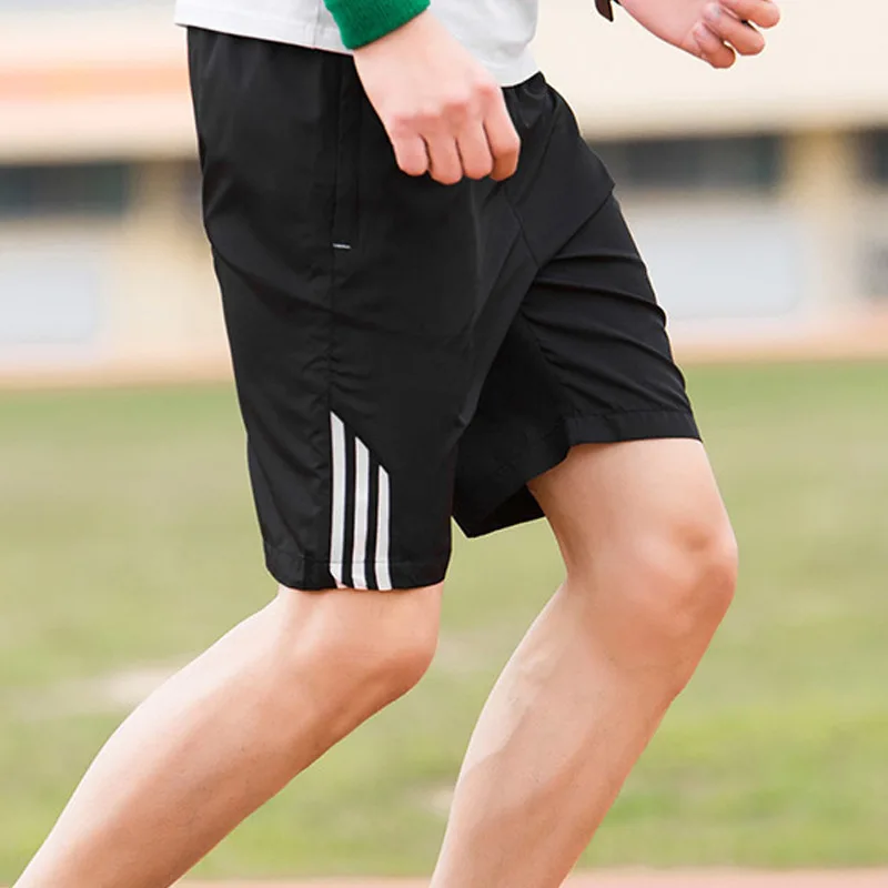 

Men's shorts 2021 summer new solid color loose fashion large size casual jogging sports shorts high quality men's clothing short