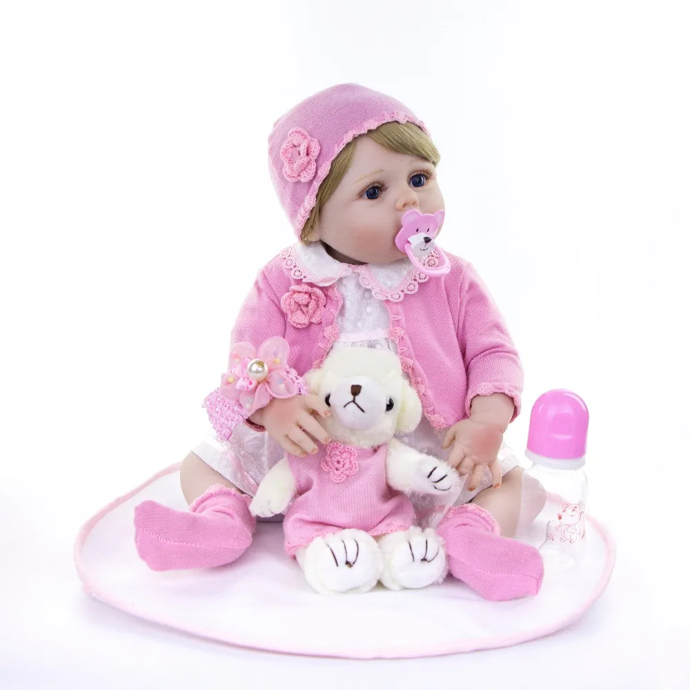Кукла DOLLMAI Bebe Reborn 57 см силиконовая Реалистичная кукла с розовой шапкой